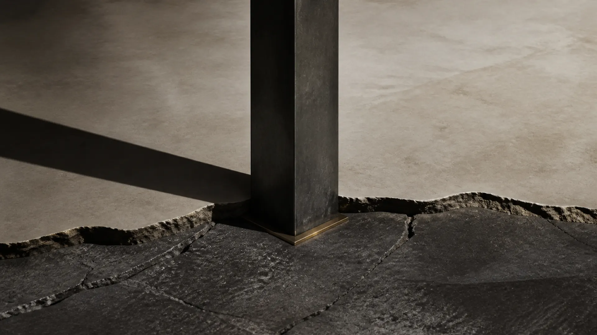 A structural steel column meeting a broken horizontal plane