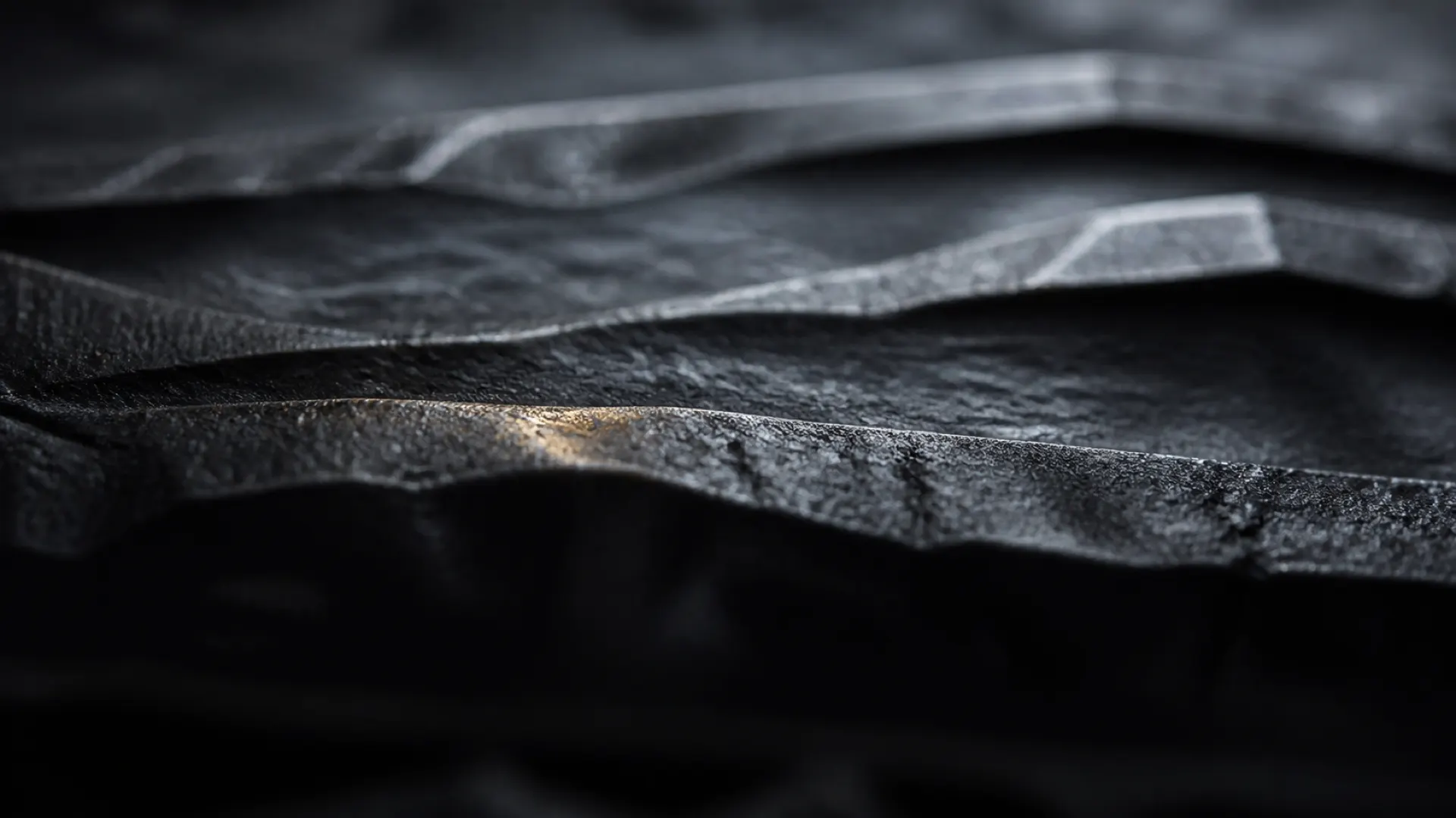 Cold-forged steel surface under restrained raking light